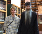 Brady and Father Justin in St. Catherine's library